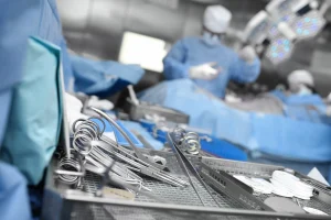 Set of surgical instruments shown while doctors make a surgical error and the patient will need to hire a lawyer.